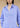 Close-up of an Asian woman wearing a periwinkle blue oversize shirt with pankou buttons